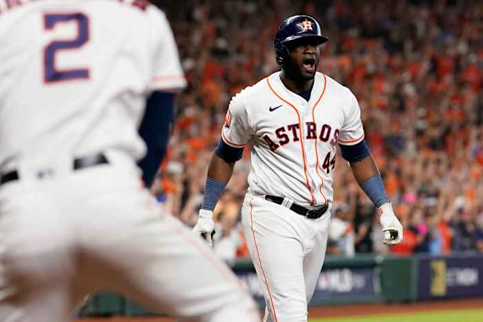 Yordan Alvarez reacts toward his teammates in the dugout after connected with his walkoff three-run home run vs. the Mariners.
